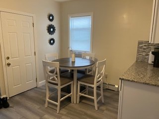 Renovated kitchen with wood cabinets and stainless appliances at Acapulco