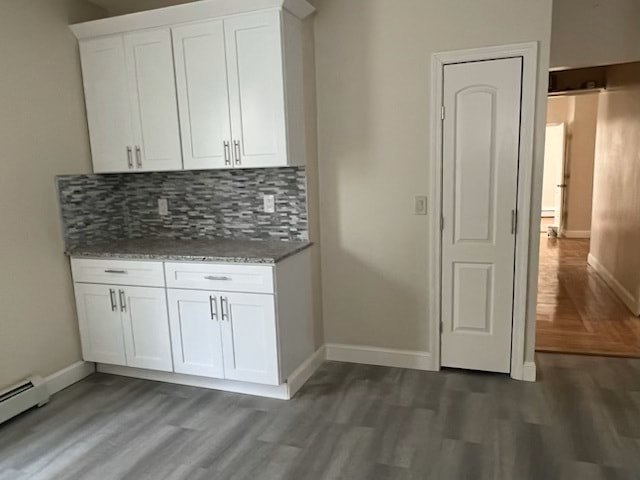 Renovated kitchen with wood cabinets and stainless appliances at Acapulco