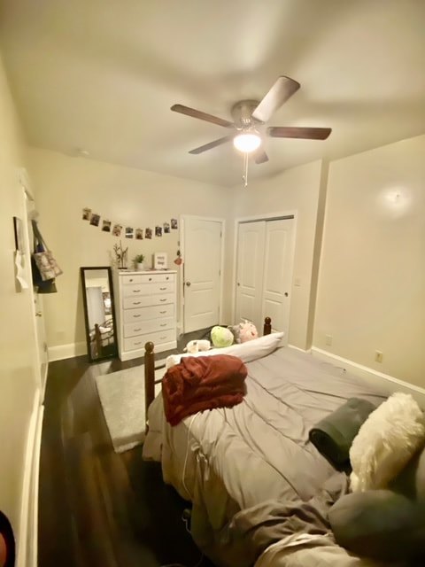Bedroom with hardwood floors and natural light at Aruba