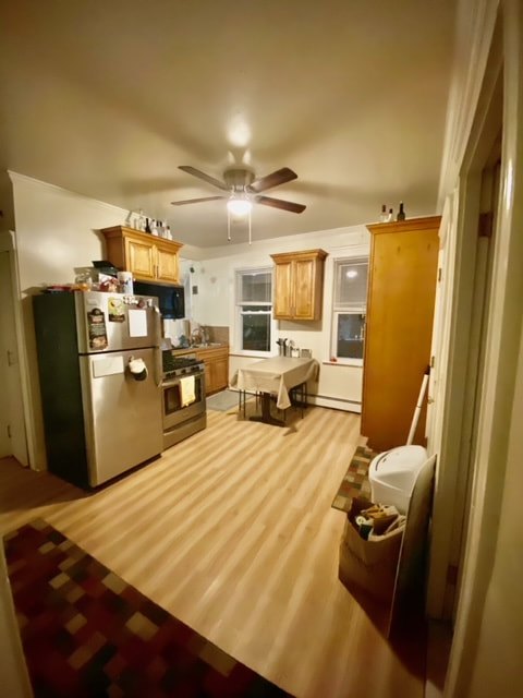 Renovated kitchen with wood cabinets and stainless appliances at Aruba