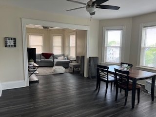 Dining table and chairs open to the living room at Bahamas