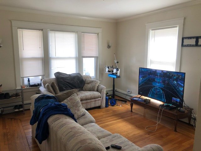Living room with hardwood floors at Cabo