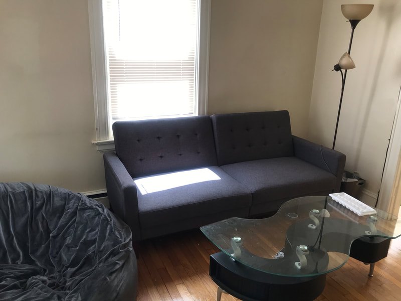 Living room with hardwood floors at Cancun