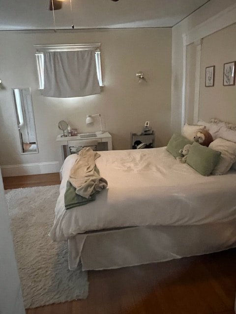 Bedroom with hardwood floors and natural light at Daytona Beach