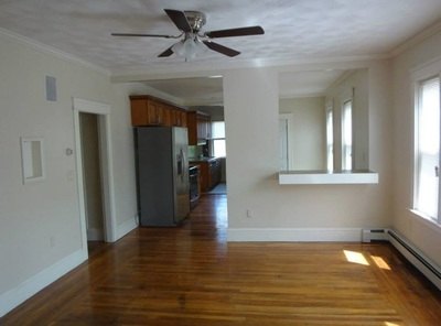 Dining area with pass-through counter open to the kitchen at Jamaica