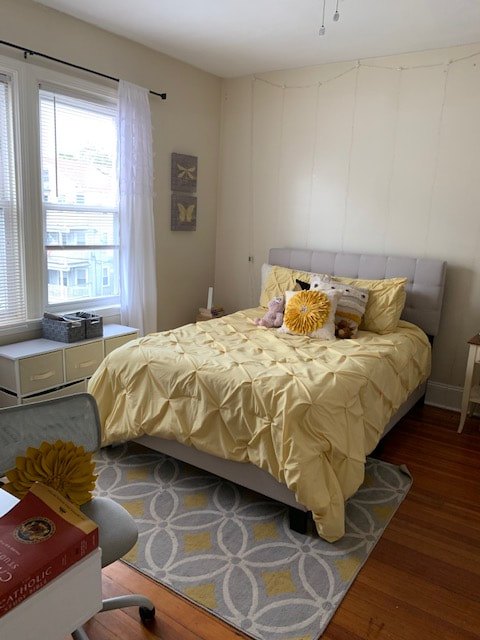 Bedroom with hardwood floors and natural light at South Beach