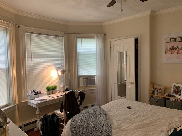 Bedroom with hardwood floors and natural light at South Beach