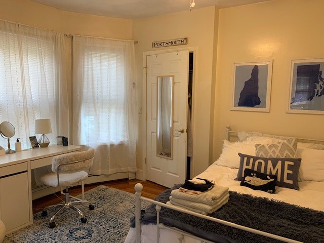 Bedroom with hardwood floors and natural light at South Beach